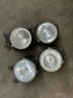 63121367515 BMW Left Right Headlight Buckets Hella E28 528E