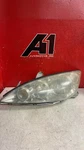 2005-2006 Toyota Camry Driver's Left Headlamp Assembly. Fixed Price $71.06.