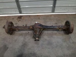 96-97 Nissan D21 Truck 4x2 Rear Axle Assembly 3.90 Ratio Fits Manual Trans. Fixed Price $759.99.