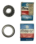 New Old Stock Differential Drive Pinion Front Bearing & Race #1799299. Fixed Price $235.00.